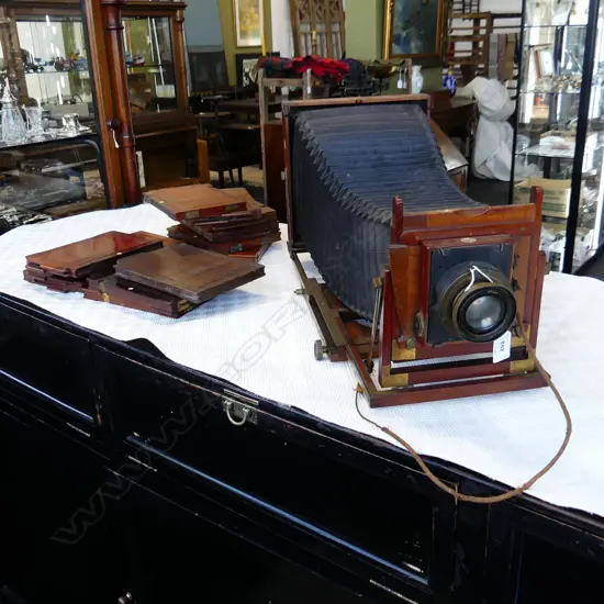 ANTIQUE BELLOWS CAMERA; THORNDON PICKARD 'IMPERIAL' TRIPLE EXTENSION L.640mm + 12 PLATE HOLDERS