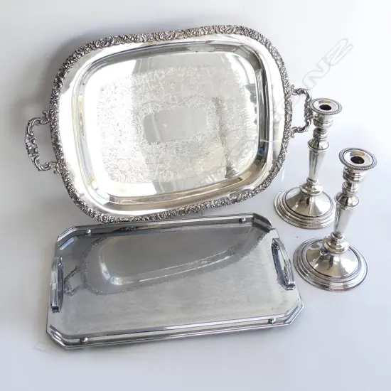 TWO SHEFFIELD WALKER AND HALL SILVER PLATE CANDLESTICKS AND TWO TRAYS ONE STAINLESS STEEL AND ONE SILVER PLATE