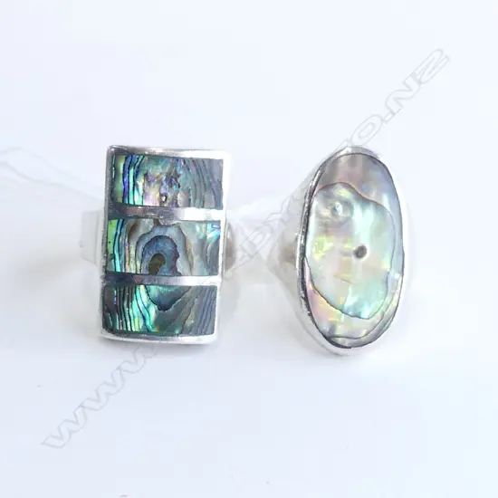 2 LARGE STG SILVER AND PAUA RINGS.