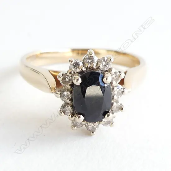9CT & DARK SAPPHIRE & DIAMOND RING 3.7 GRAMS SIZE O 1/2