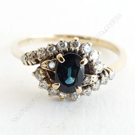 9CT & DARK BLUE SAPPHIRE & DIAMOND RING 2.1 GRAMS