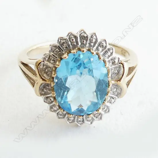 9CT  SMALL DIAMONDS & BLUE STONE RING 3.9 GRAMS