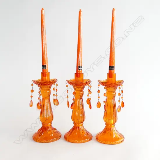 3 ORANGE PRESSED GLASS CANDLESTICKS H.250mm