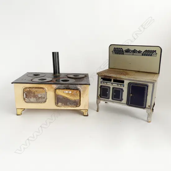 TWO VINTAGE CHILD’S TOY OVENS, ONE WITH KEROSENE BURNERS AND HOT PLATES L. 300mm L. 230mm