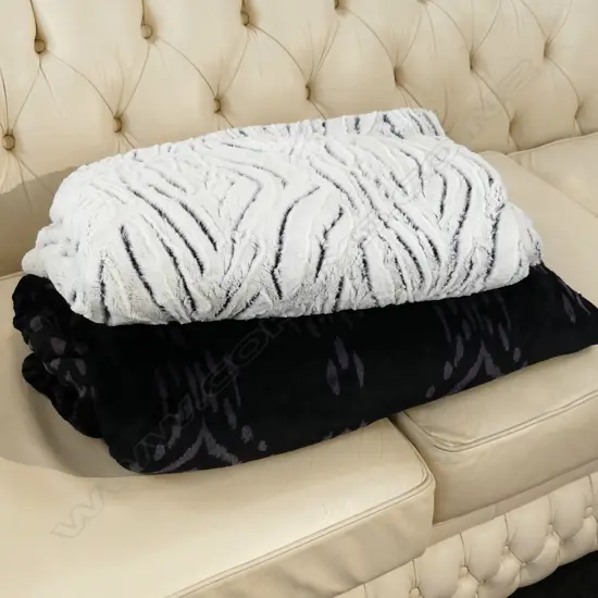 2 FAUX FUR THROWS