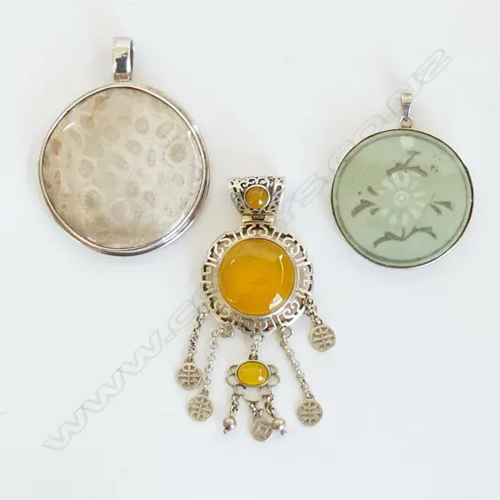  3 LARGE SILVER MOUNTED PENDANTS.