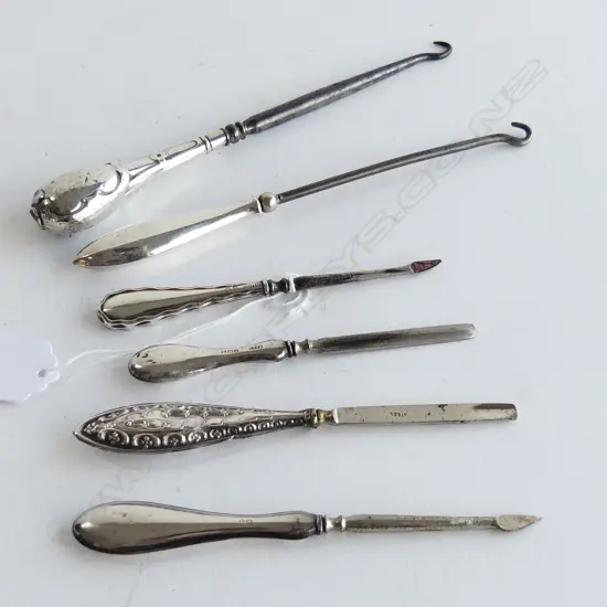 4 Stg Manicure pieces and 2 Stg Button Hooks.