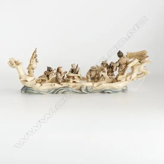 ORIENTAL DRAGON BOAT WITH 9 FIGURES, SIGNED,  L. 490mm