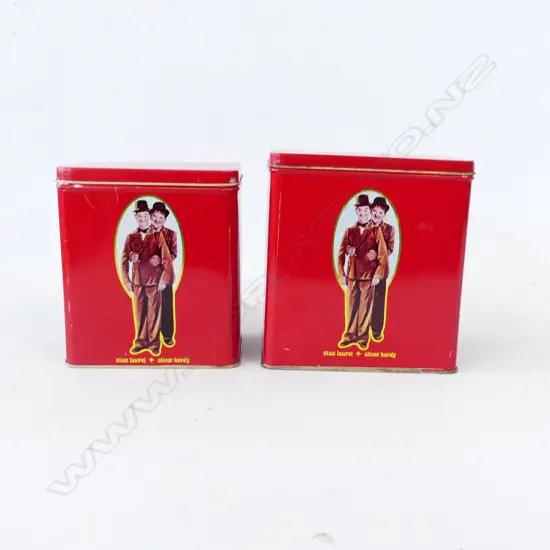 TWO RED VINTAGE LAUREL AND HARDY STORAGE TINS  h. 150, 138mm
