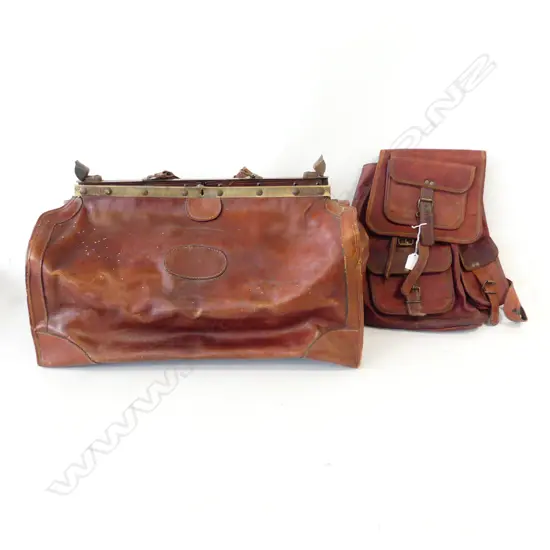 TWO LEATHER BAGS. SATCHEL AND TRAVEL BAG ( WEEKENDER)