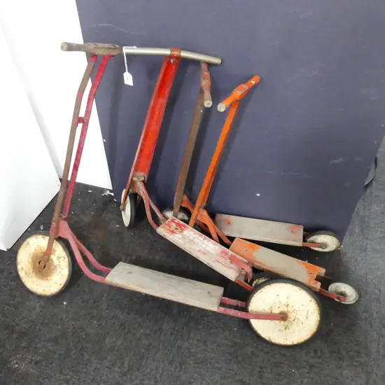 4 VINTAGE RED SCOOTERS