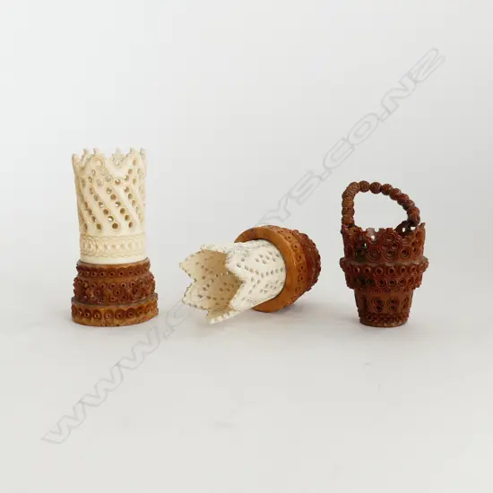 2 CARVED COQUILLA NUT & BONE DICE SHAKERS & COQUILLA NUT BASKET.