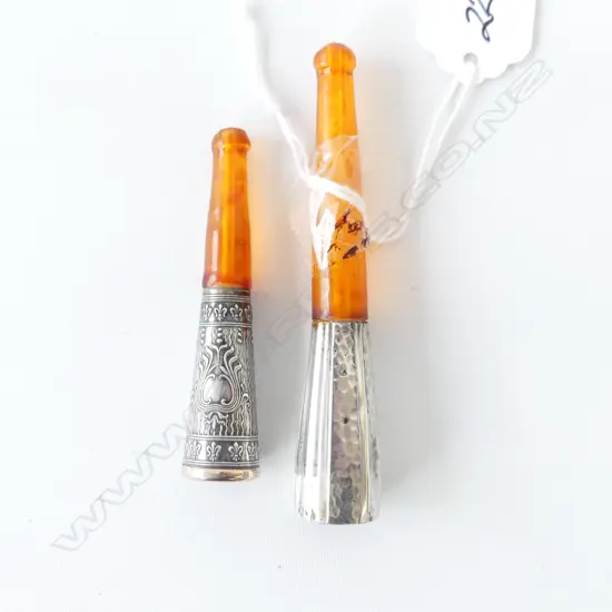 TWO STERLING SILVER AND AMBER EUROPEAN CIGAR HOLDERS L. 95MM, 70MM