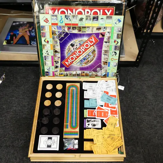 MONOPOLY DELUXE 7  GAME SET INCLUDES CLUEDO, CHESS, CHEQUERS, CARDS, DOMINOES AND CRIBBAGE  