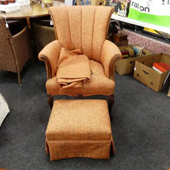UPHOLSTERED CHAIR w. MATCHING FOOTSTOOL + EXTRA FABRIC