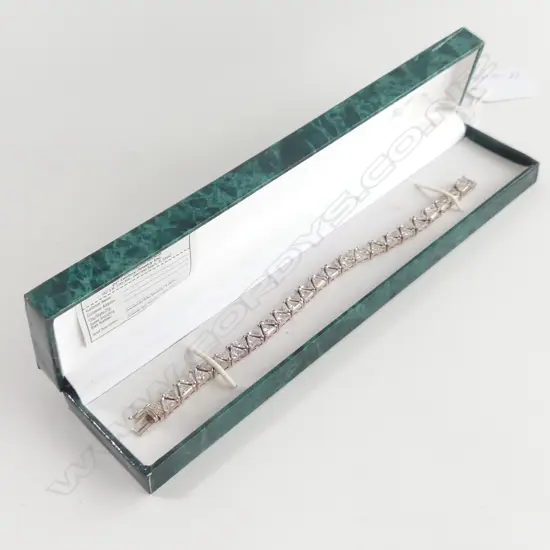 SUZANNE SOMERS 925 SILVER TRILLIANT CUT CZ BRACELET 24.34GMS