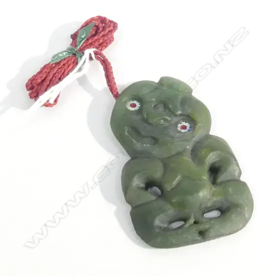 POUNAMU (GREENSTONE) LG TIKI PENDANT ON RED WAXED ADJUSTABLE CORD