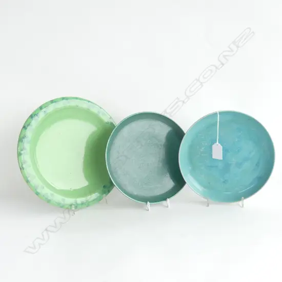 3 ART POTTERY PLATES; RUSKIN ETC (blue w. cutting marks) 240mm dia