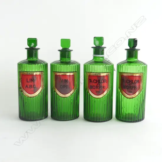 SET 4 C1900 GREEN GLASS CHEMIST'S BOTTLES W RED & GILT LABELS...