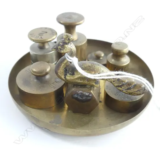 8 SMALL BRASS WEIGHTS ON TRAY the largest 50mm