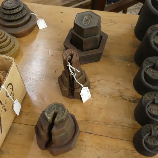 12 CAST IRON WEIGHTS ALL EITHER HEXAGONAL HEPTAGONAL OR PENTAGONAL 