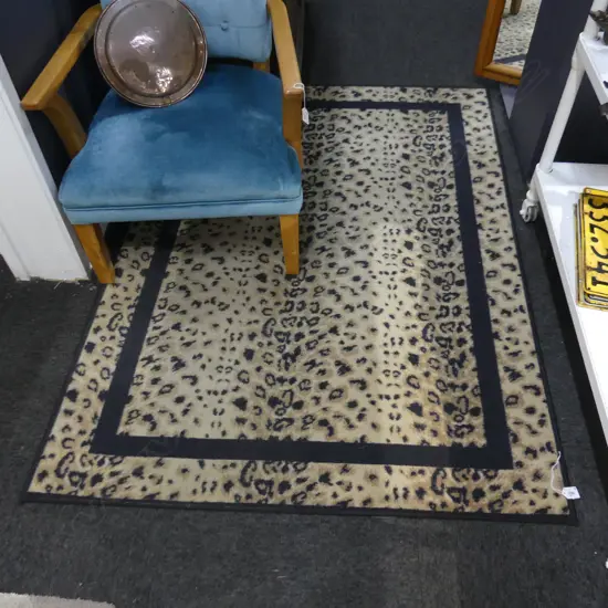 LEOPARD PRINT MACHINE KNOTTED RUG 1600x1160mm