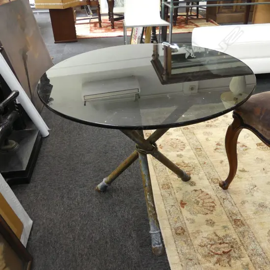 OUTDOOR TABLE; BLACK GLASS TOP ON 3 METAL LEGS AF 700mm dia