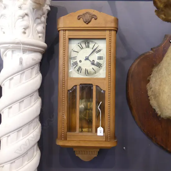 OAK & BEVALLED GLASS WALL CLOCK 680/ 270