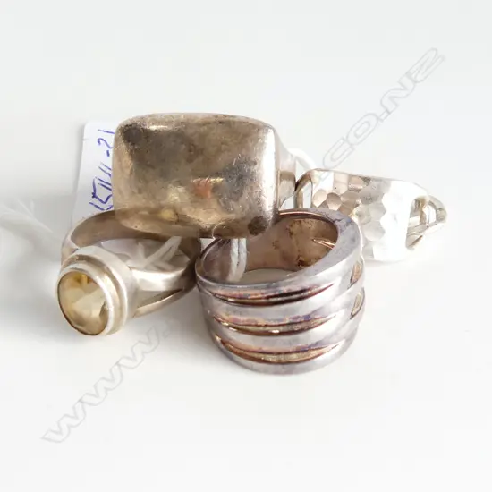 4 DESIGNER VARIOUS SILVER RINGS 28gms