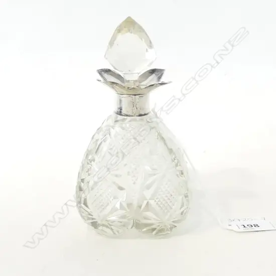 VINTAGE CUT GLASS SCENT BOTTLE WITH STG SILVER COLLAR & FRILLED RIM.  H.145mm, BIRM. 1902