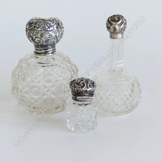 3 VINTAGE CUT GLASS & STG SILVER LIDDED SCENT BOTTLES H. 90, 90, 40mm
