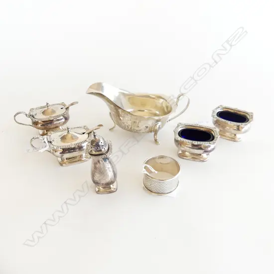 7 ITEMS. 4 PLATED BLUE GLASS LINED CRUETS PEPPER & STERLING SAUCE BOAT ( 63.38 GMS) & SERVIETTE RING ( 12.46GMS)