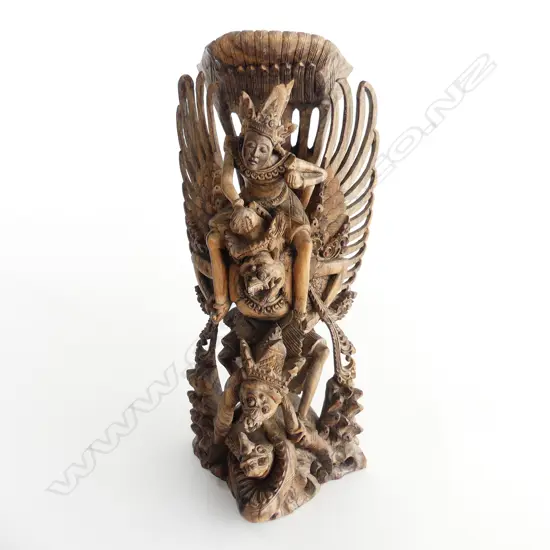 LARGE INTRICATE CARVING OF VISHNU RIDING GARUDA. H 36CM W 15CM