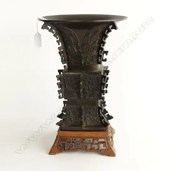 LARGE BRONZE ORIENTAL VASE WITH WOODEN STAND H. 315mm