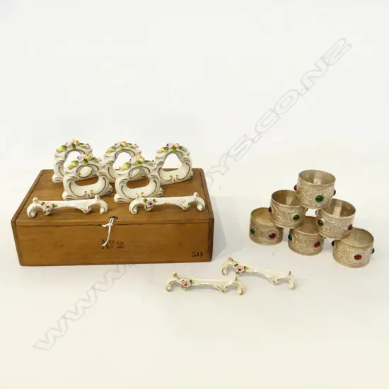 BOX 6 UNMARKED SILVER NAPKIN RINGS + PORCELAIN SPOON RESTS ETC;