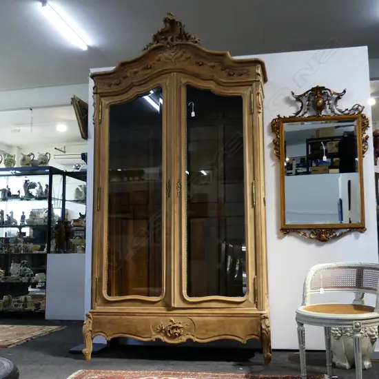 early 20thC PALE WALNUT ARMOIRE glazed shaped panelled doors