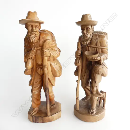 PAIR OF LARGE AUSTRIAN WOOD CARVINGS OF TRAVELLING MEN. H40CM