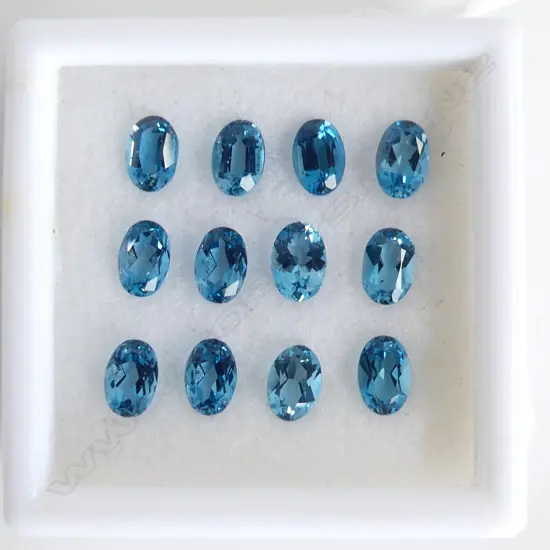 12x BLUE TOPAZ 6X4 OVAL = 6.72CT