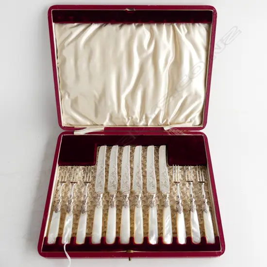 A good early 20thC cased silver plate and mother-of-pearl handled fruit set