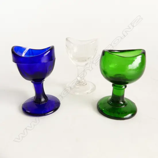 3 ANTIQUE GLASS EYE BATHS GREEN, COBALT BLUE, AND CLEAR W.T ENGLAND H. 60Mmm