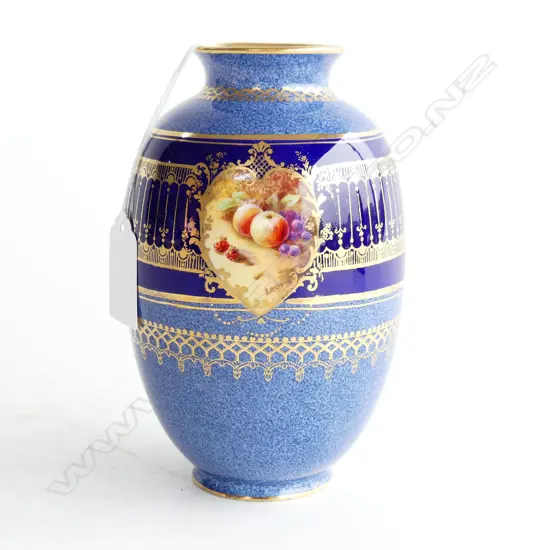 A high quality Royal Doulton white bone china ovoid vase