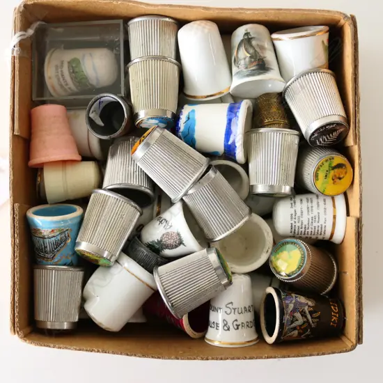 BOX OF OVER 50 THIMBLES.