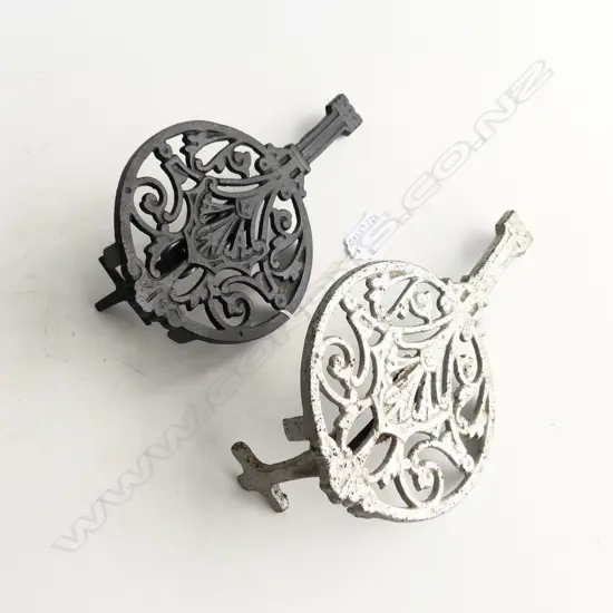 TWO ANTIQUE CAST IRON TRIVETS WITH ADJUSTABLE CLAMPS BRITISH MADE L. 220mm