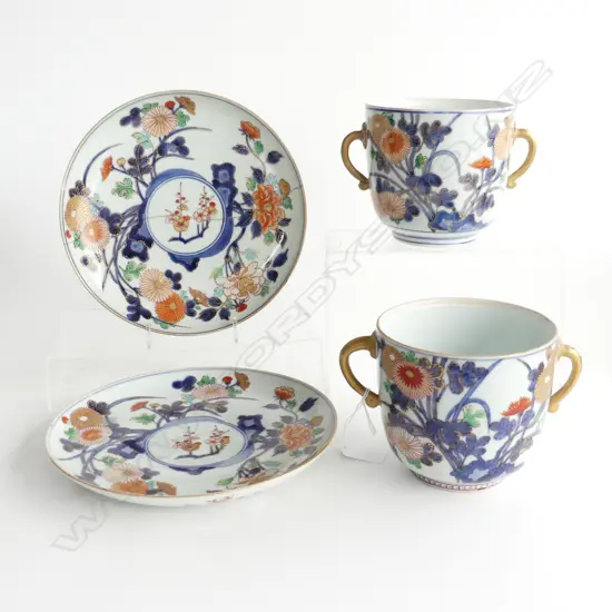 PAIR OF OVERSIZE JAPANESE IMARI TWO-HANDLED CUPS AND SAUCERS (old repairs & one with staple repairs) dia.210mm