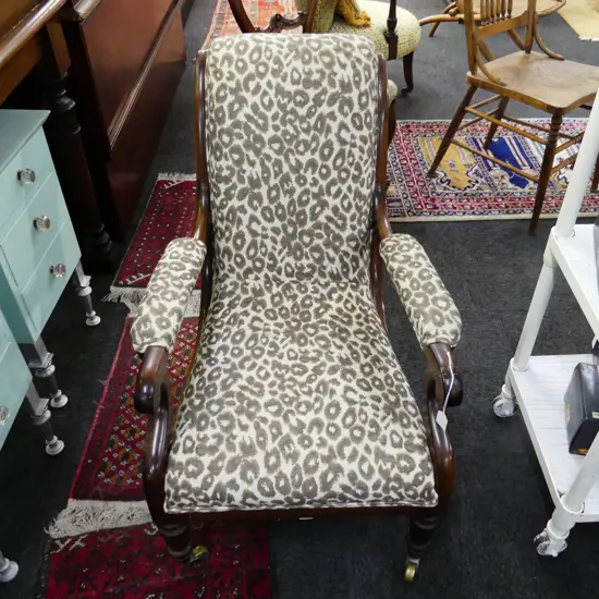 VICTORIAN ARMCHAIR UPHOLSTERED IN LEOPARD PRINT FABRIC 