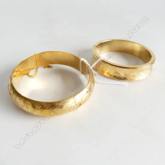 TWO GOLD PLATED BRACELETS WITH ENGRAVED PATTERN