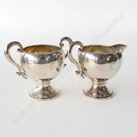 STG SIL MILK & SUGAR,’E’ MONOGRAM, MARKED STG ON BASE 160GMS