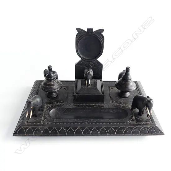 EBONY DESK STANDISH WITH 2 LIDDED INKWELLS, LIDDED CENTRE BOX AND 5 TUSKED ELEPHANTS
