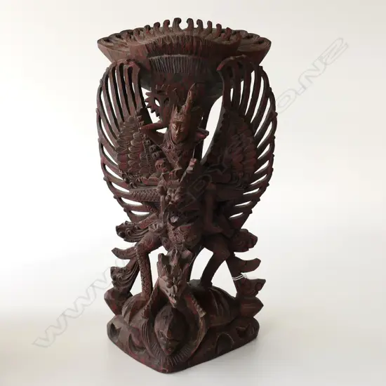 HUGE INTRICATE CARVING OF VISHNU RIDING GARUDA. H 46CM W28CM