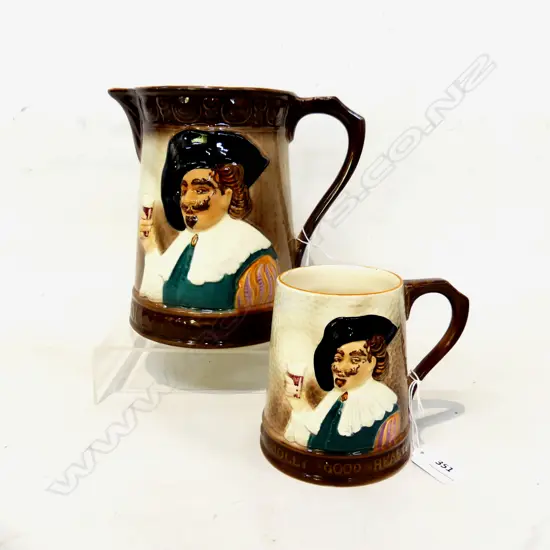 TWO FALCONWARE ITEMS. LARGE (H. 200mm) AND SMALLER ( H. 120mm ) THEME ' JOLLY GOOD HEALTH '